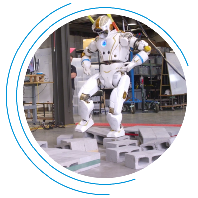 AI-powered robot walking from one cinderblock to another